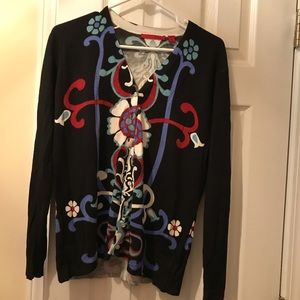 Red “Nordstrom” cardigan.